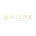 dé LUXE logo