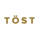 TÖST logo